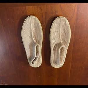 Beach slippers are a size Medium
